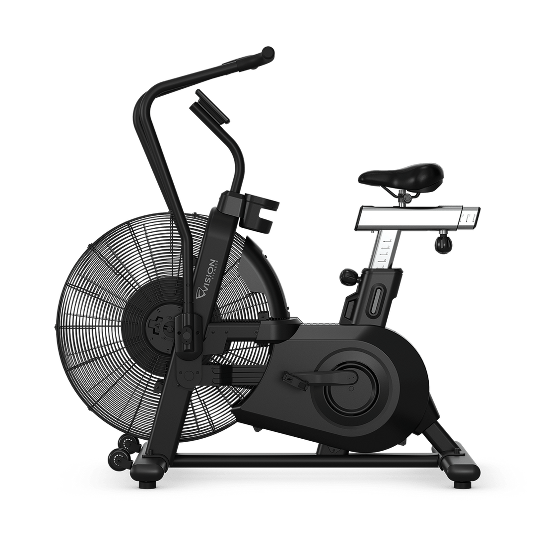 Side view of Vision Fitness AB700 air bike showing fan, belt-drive housing, adjustable seat, pedals, and handlebars