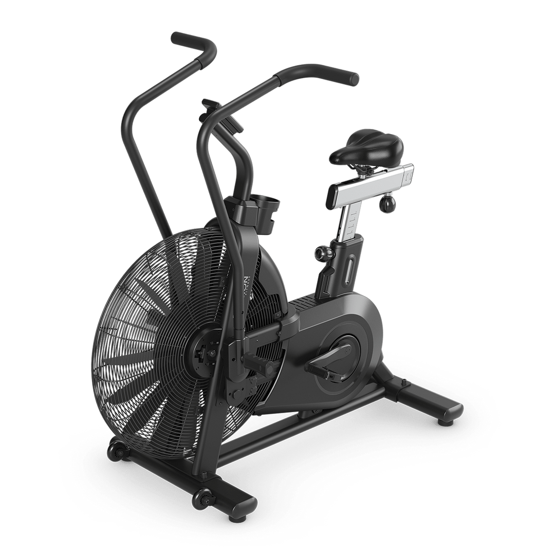 Three-quarter view of Vision Fitness AB700 air bike with fan resistance system, saddle, pedals, and handlebars