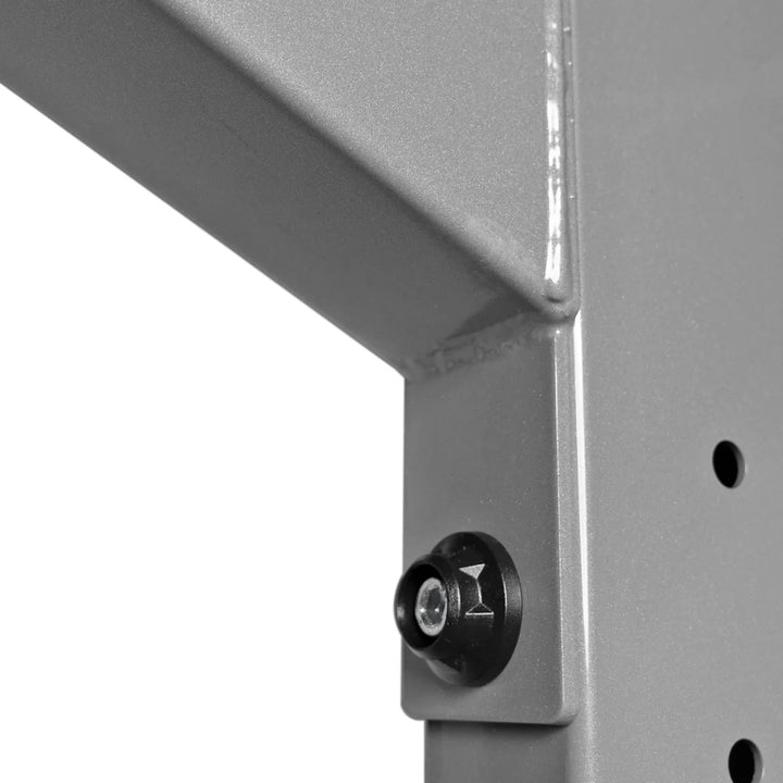 Close-up of Torque USA X-CREATE single-sided 8 ft upright in Platinum showing its angled steel bracket and mounting hardware.