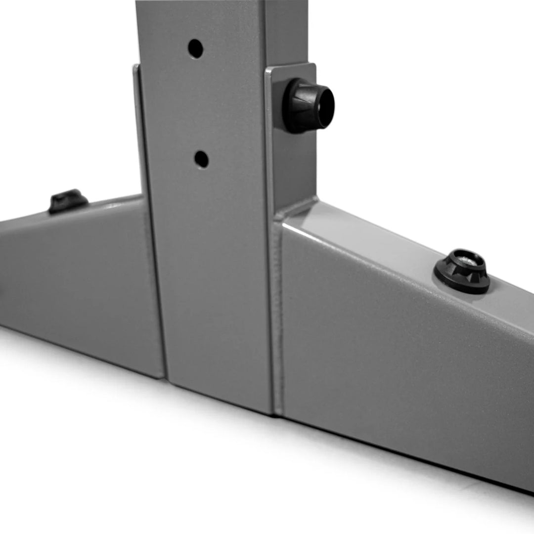 Close-up of X-CREATE 2-sided 8 ft upright in Platinum showing the lower steel post connection and base hardware.