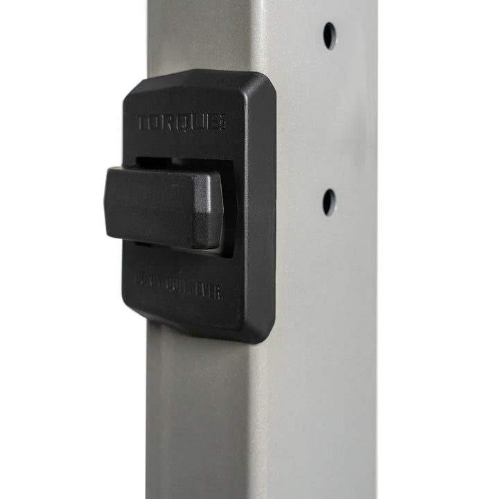 Close-up of X-CREATE 2-sided 8 ft upright in Platinum featuring a black magnetic suspension strap holding clip.