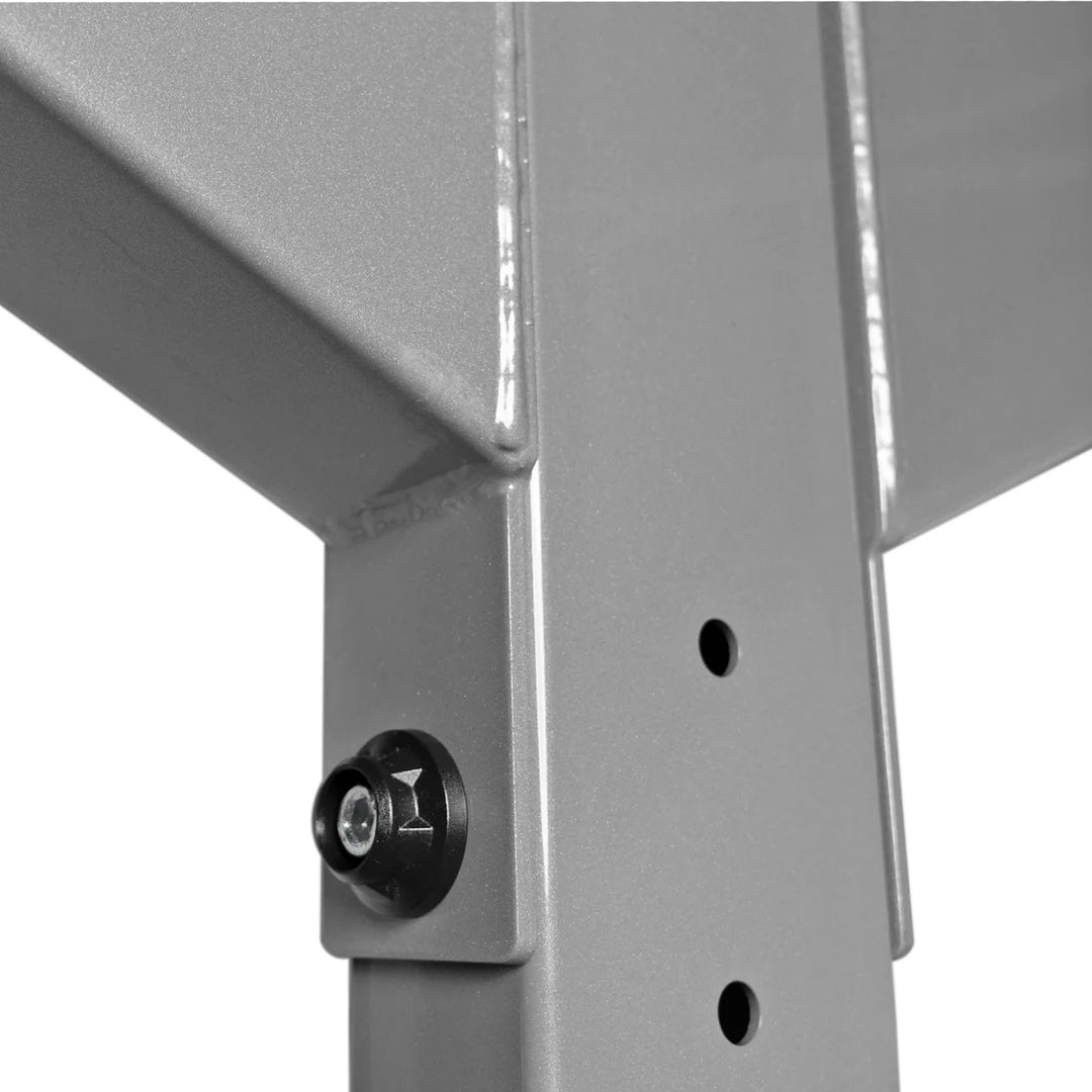 Close-up of X-CREATE 2-sided 8 ft upright in Platinum showing the steel upper bracket connection and mounting holes.