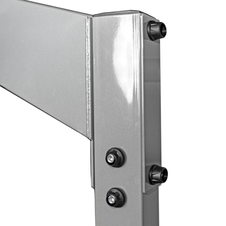 Close-up of Torque USA X-CREATE single-sided 8 ft upright in Platinum showing the upper steel connection and black bolts.