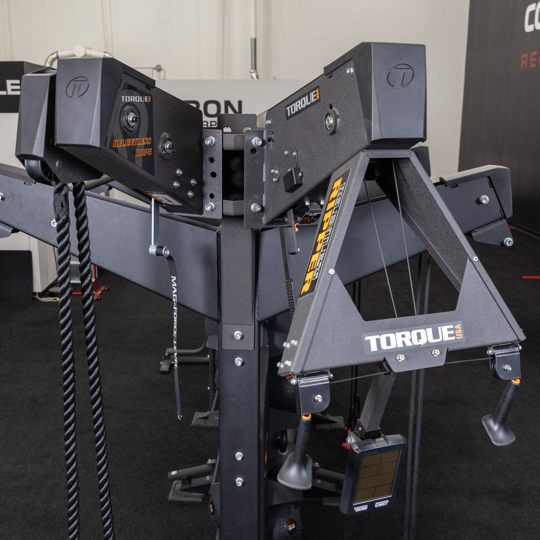 Close-up of the Torque USA X-CREATE side attachment mount in Black installed with rope training equipment.