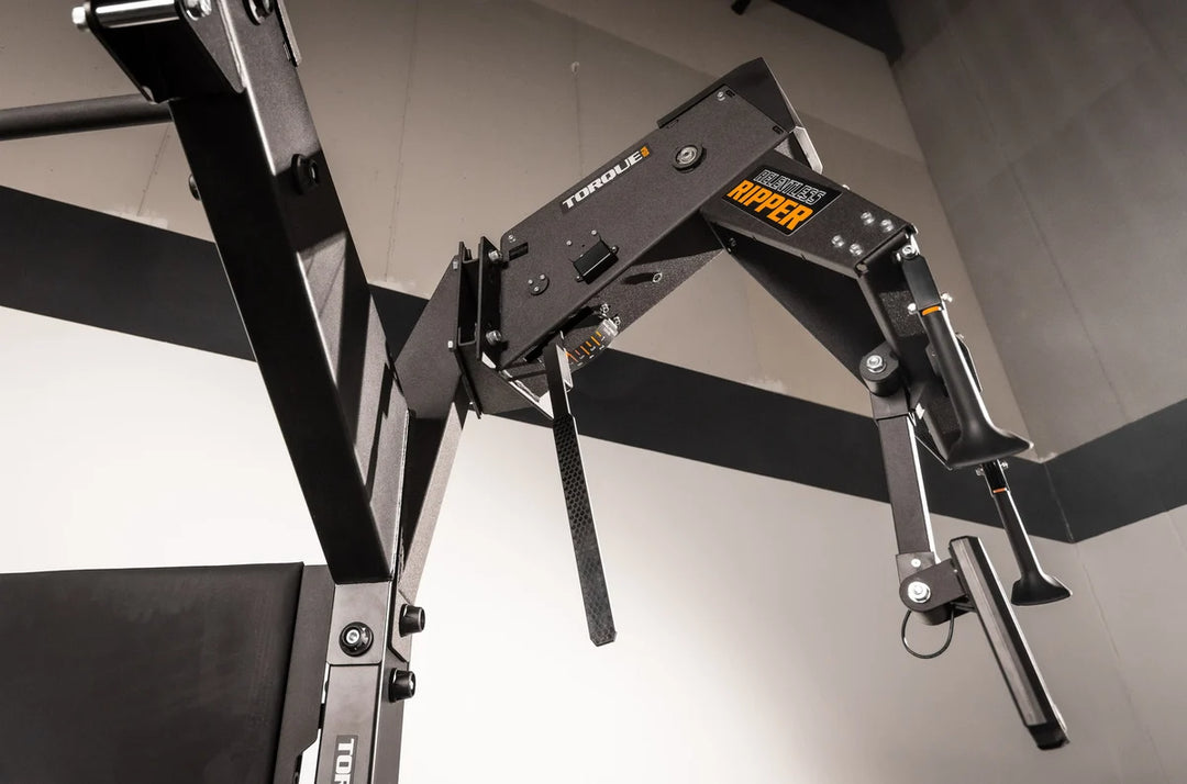 Torque USA X-CREATE side attachment mount with black single unit wedge connected to Relentless Ripper training equipment.