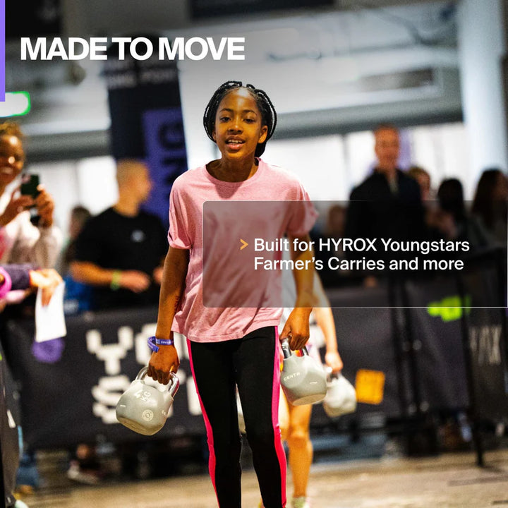 Young athlete performing Farmer's Carries with a Centr x HYROX Youngstars octo kettlebell.