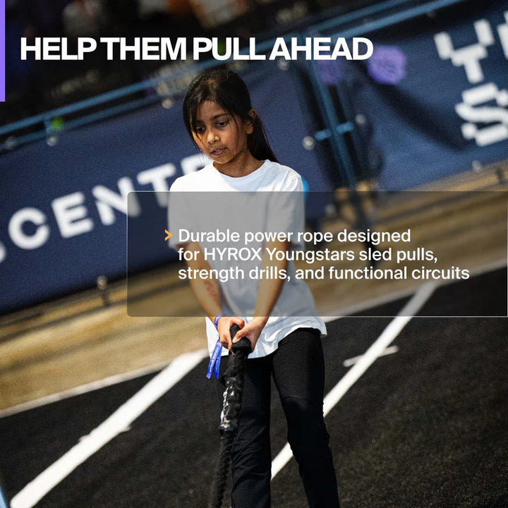 Athlete using the Centr x HYROX Competition Power Rope during HYROX Youngstars sled pull training.