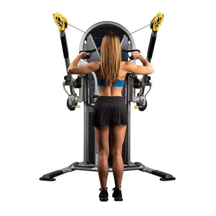 Rear view of person using functional trainer cable machine
