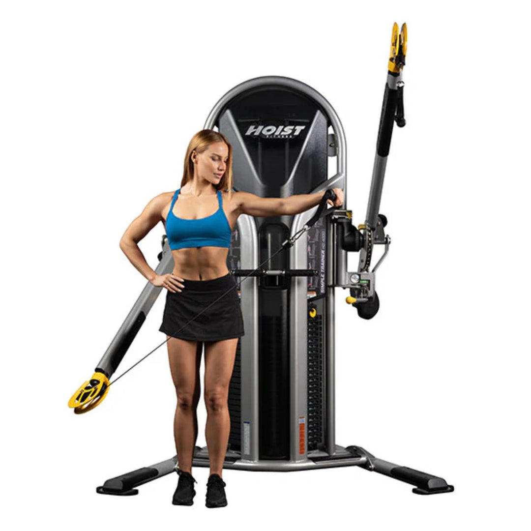 Person exercising on a functional trainer cable machine