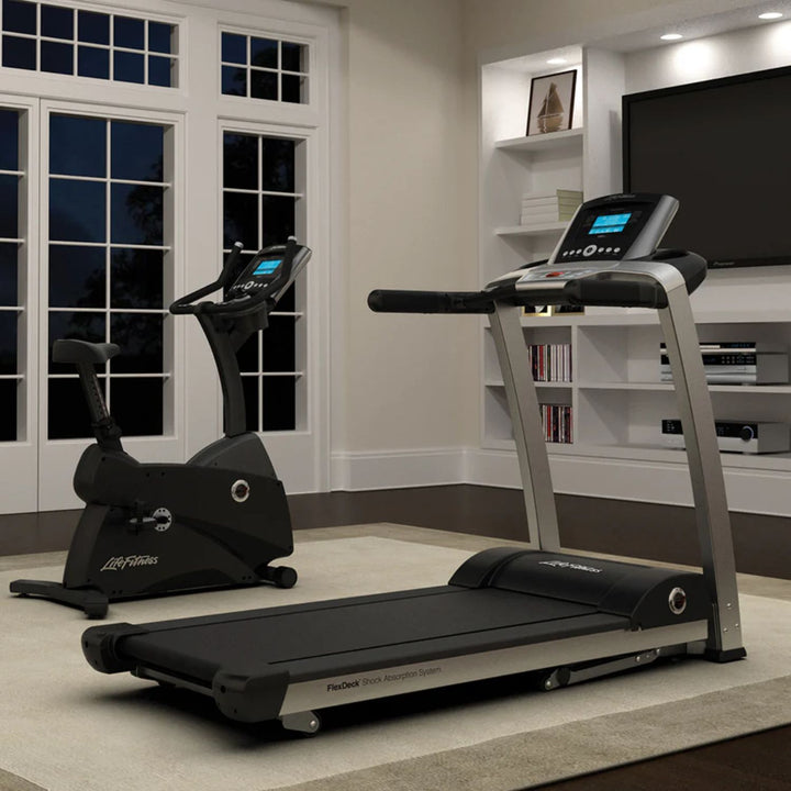 Cardio machine console with heart rate monitoring and LCD screen for home gym use
