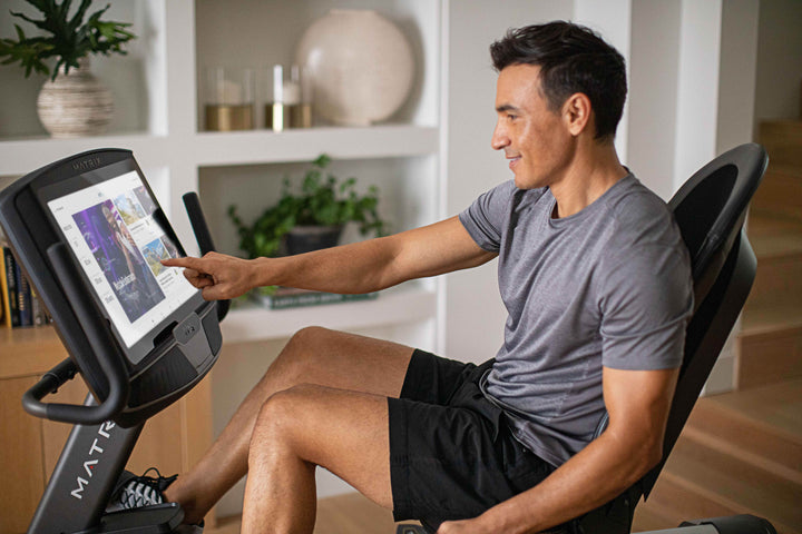 Matrix R50 recumbent bike with XUR showing iFit app