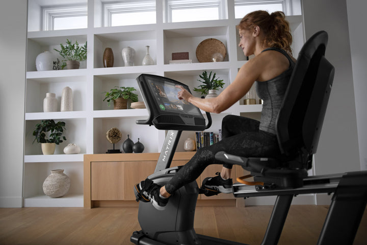 Matrix R50 recumbent bike with XUR console displaying Virtual Active selection