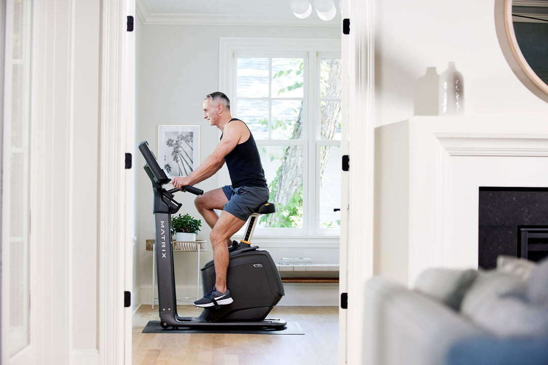 Matrix U30 upright bike being used in a home