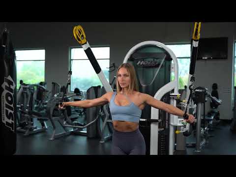 dual pulley functional trainer workout demonstrating cable exercises for full body strength training in home or commercial gym